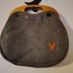 Cute bird emblem purse with wooden handle